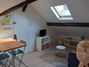 Appartements A 300 m de Paris, sous les toits : photos des chambres