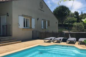 Villas Villa with air con heated pool bubble bath fenced garden and kids play equipment : photos des chambres