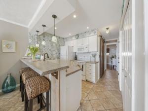 Conched Out - Feel the ocean breezes as you relax on the deck overlooking the lovely Carolina Beach coastline condo