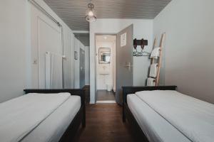 Quadruple Room with Private Bathroom room in NO8 Boutique Hotel