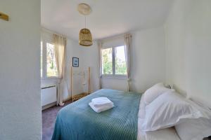 Appartements Clemence Green - 2 velos - wifi - sauna - salle de sport - netflix : photos des chambres