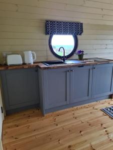 Spring Tide Cliff Top Glamping Pod with direct Sea Views