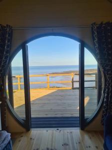 Spring Tide Cliff Top Glamping Pod with direct Sea Views