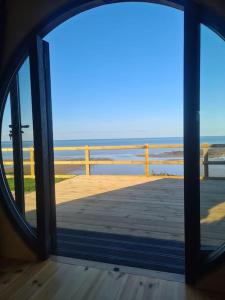 Spring Tide Cliff Top Glamping Pod with direct Sea Views