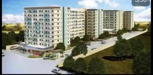 One spatial iloilo city two bedroom condo with free Netflix wifi pool and Gym - Babuy