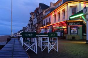 Appartements Beau F2, vue sur mer, a deux pas de Courseulles. : photos des chambres