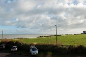 Appartements Beau F2, vue sur mer, a deux pas de Courseulles. : photos des chambres