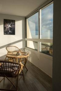 Appartements Beau F2, vue sur mer, a deux pas de Courseulles. : photos des chambres