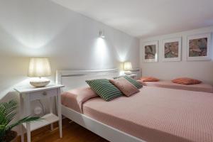 Casa Tuga, in centro con giardino e posto auto