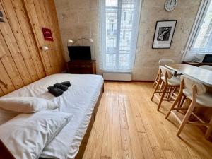 Appartements Le Woody, Centre-ville, Parking gratuit : photos des chambres