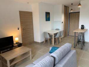 Appartements Appartement neuf en coeur de station : photos des chambres