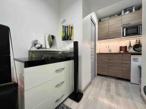 Appartements Beau studio tout confort : photos des chambres