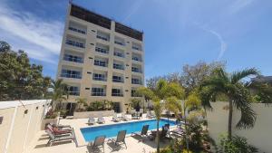 Hermoso departamento con alberca cerca de la playa