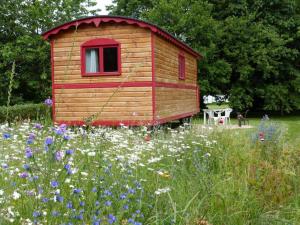 Tentes de luxe La roulotte du Leff : photos des chambres