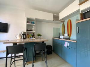 Appartements GROOMI Le Surfeur - Studio proche plage ! : photos des chambres