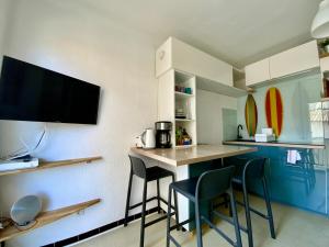 Appartements GROOMI Le Surfeur - Studio proche plage ! : photos des chambres