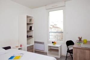 Appart'hotels Sejours & Affaires Annecy Le Pont Neuf : photos des chambres