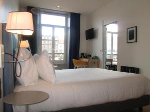 Hotels The Originals Boutique, Hotel Le Lion, Clermont-Ferrand : photos des chambres