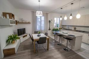 Appartements La Villa des Fleurs : photos des chambres