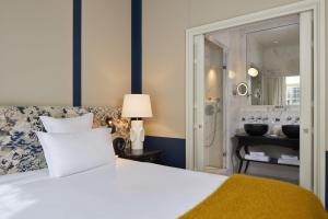 Hotels Le Pavillon de la Reine & Spa : photos des chambres