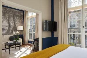 Hotels Le Pavillon de la Reine & Spa : photos des chambres