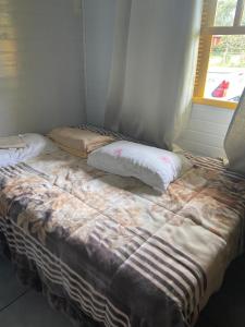 Casa com piscina e salão de jogos para aluguel de temporada e finais de semana em TorresRS.