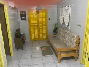 Casa com piscina e salão de jogos para aluguel de temporada e finais de semana em TorresRS.