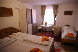 Fészek Fogadó - Pension Nest