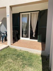 Apartamento bajo con piscina Macarella