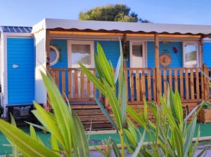 Villages vacances Mobil home dans camping 4* acces direct plage : photos des chambres