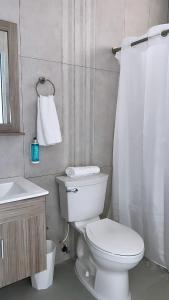 Quadruple Room with Sea View room in Red Flamboyan Guesthouse and Restaurant