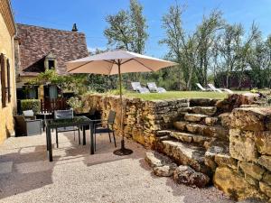 Maisons de vacances Magnifique maison en pierre proche de Sarlat : photos des chambres