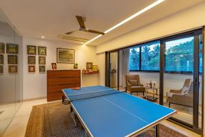 Oceanic Sunsets with River View, Comp Breakfast & Infinity Pool at StayVista