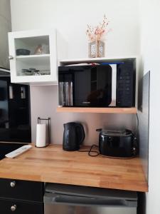 Appartements Les Amandiers : photos des chambres