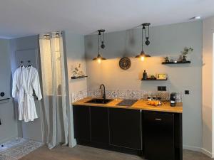 Appartements Suite Garonne - baignoire balneo duo a bulles - Luxe et charme - climatisation : photos des chambres
