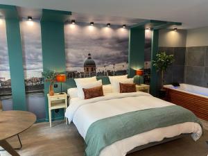 Appartements Studio Garonne avec baignoire balneo - climatise : photos des chambres