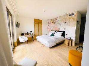 Hotels AUX DUCS DE SIENNE : photos des chambres