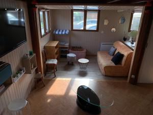 Chalets Chaleureux chalet en bord de mer : photos des chambres