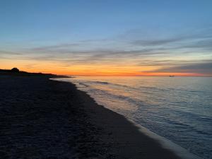 Chalets Chaleureux chalet a 200m de la mer : photos des chambres