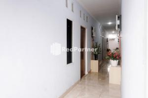 Tassa Homestay Syariah Mitra RedDoorz