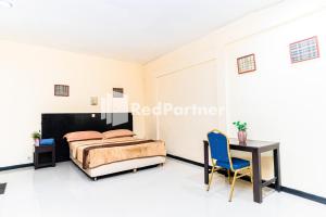 Cherry Pink Hotel Medan Mitra RedDoorz