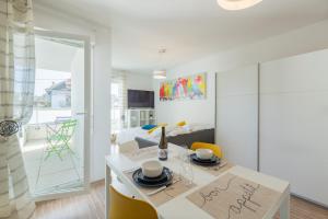 Appartements Studio Cosy les Perruches : photos des chambres