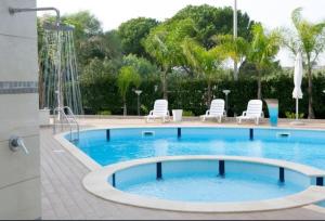 Esperienza Luxury fronte mare con piscina