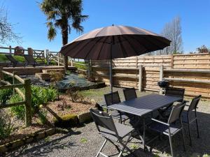 Maisons de vacances Maison chaleureuse avec terrasse et vue baie : photos des chambres