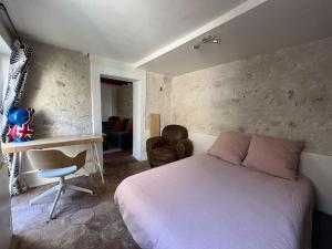 Appartements Chez Phil - Centre ville Moret sur loing : photos des chambres