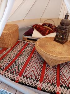 Tentes de luxe Ecolodge de la Ferme du Chant de Cailloux : photos des chambres