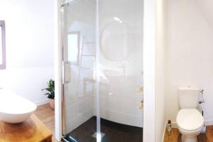 Maisons de vacances Charmante maison proche de la mer : photos des chambres