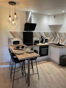 Appartements La petite maison Pasteur : photos des chambres