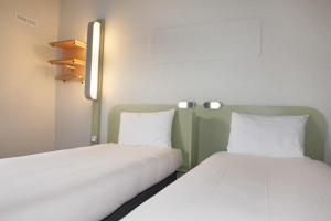 Hotels ibis budget Goussainville Charles de Gaulle : photos des chambres