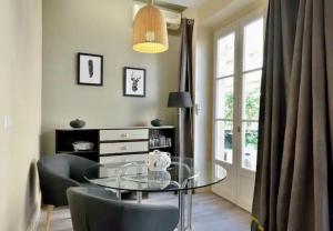 Appartements Casa Gambetta #4 - Cosy T2 avec Clim & Balcon - Hyper Centre Brive : photos des chambres